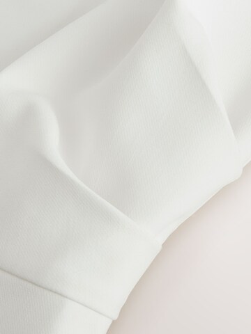 Combinaison Next en blanc