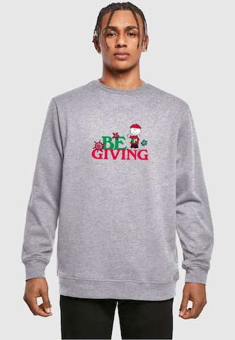 Merchcode Sweatshirt 'Peanuts Be Giving' in Grijs: voorkant