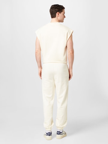 Tapered Pantaloni 'CHIPUDE' di FILA in bianco