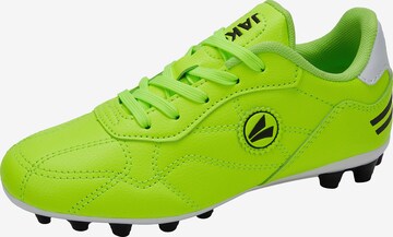 JAKO Soccer Cleats in Green: front