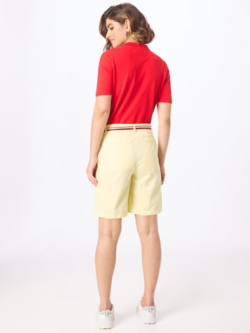 TOMMY HILFIGER Ohlapna forma Chino hlače | rumena barva