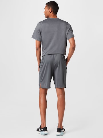 NIKE Sportovní kalhoty '6.0' – šedá