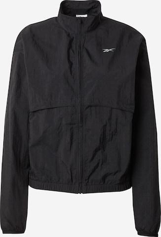 Reebok - Chaqueta de chándal en negro: frente