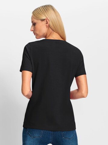 Tricou de la heine pe negru