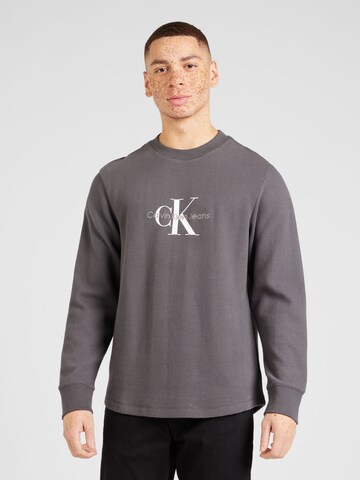 Calvin Klein Jeans T-shirt i grå: framsida