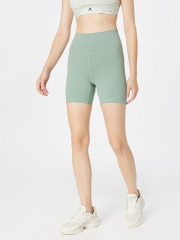 ADIDAS PERFORMANCE Skinny Workout Pants 'Studio' in Green: front