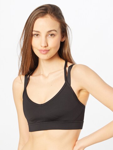 PUMA Bralette Sports Bra in Black: front