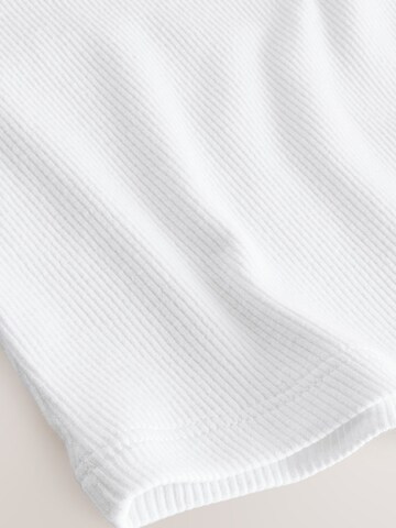Haut Next en blanc