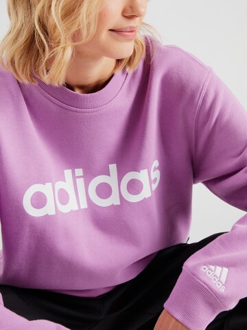 ADIDAS SPORTSWEAR Sportsweatshirt 'Essentials Linear' in Lila