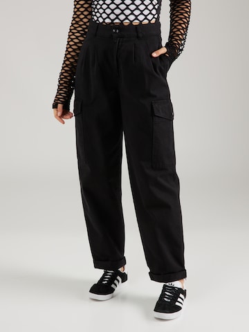 Carhartt WIP Tapered Cargo Pants in Black: front