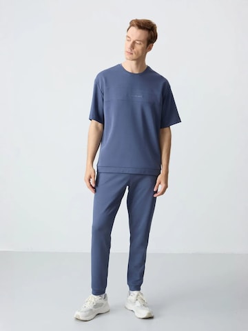 Tommy Life - Fato de desporto em azul: frente