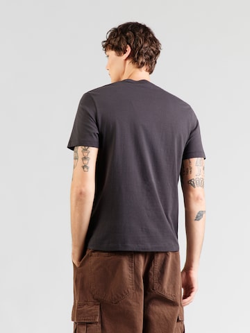 TIMBERLAND Majica 'ESTABLISHED 1973' | črna barva