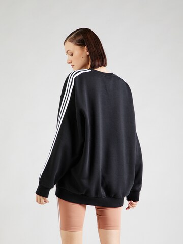 ADIDAS SPORTSWEAR Urheilullinen collegepaita 'Essentials' värissä musta