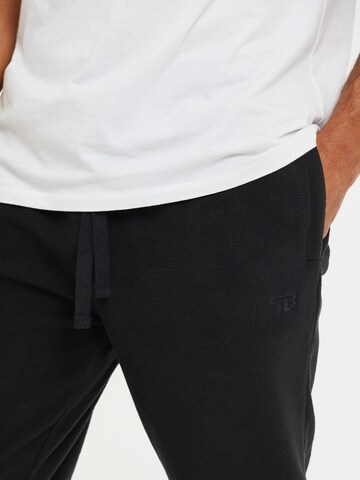 Effilé Pantalon Threadbare en noir