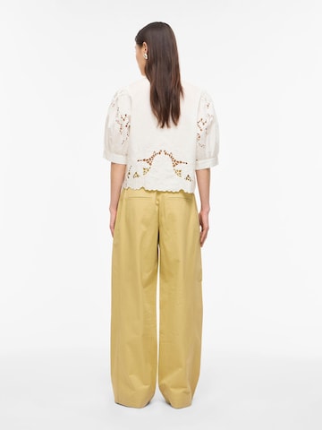 Wide leg Pantaloni di ROUGE EDIT in giallo