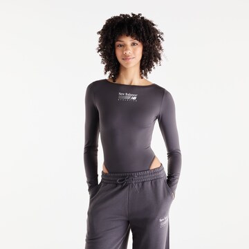 new balance Sportbody 'Trackside Long Sleeve Bodysuit' in Zwart: voorkant