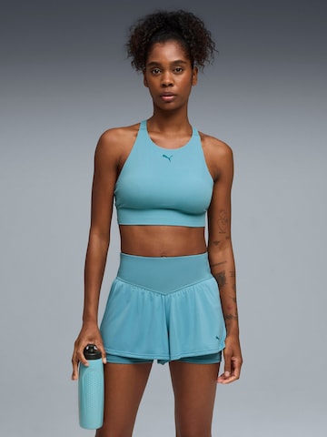 Top sportivo 'Puma Shapeluxe High Neck Bra' di PUMA in blu