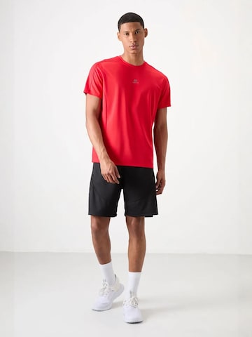 T-Shirt fonctionnel Tommy Life en rouge