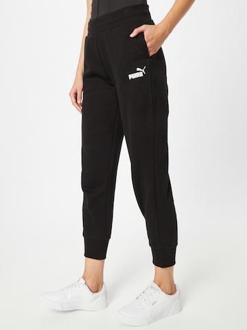 Effilé Pantalon de sport 'Essentials' PUMA en noir : devant