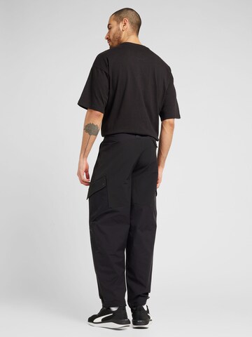 regular Pantaloni sportivi 'SEASONS' di PUMA in nero