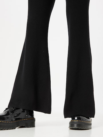 WEEKDAY Flared Trousers in Black