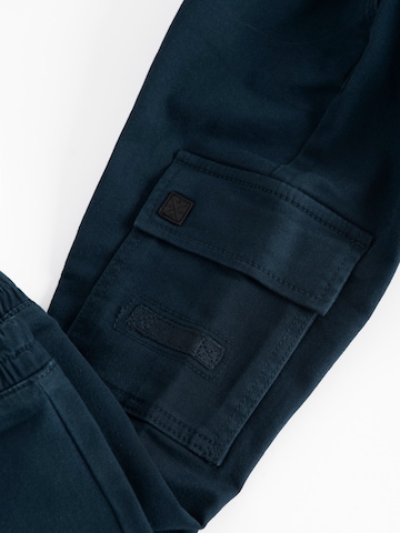 Effilé Pantalon Cool Club en bleu
