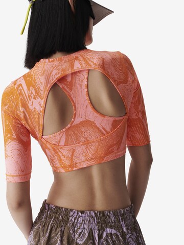 ADIDAS BY STELLA MCCARTNEY - Camiseta funcional 'Truenature ' en naranja