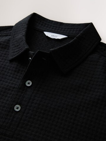 Next Poloshirt in Schwarz