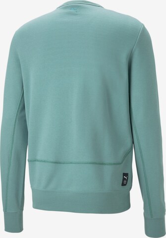 PUMA Sportsweatshirt 'Pivot' in Grün