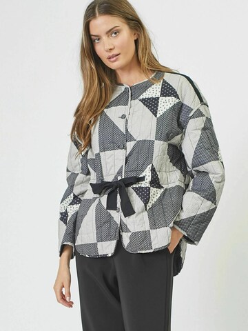 Veste mi-saison 'Patchie' co'couture en bleu : devant