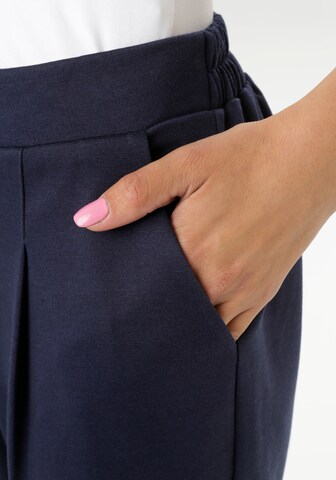 Aniston SELECTED Tapered Pleat-Front Pants in Blue