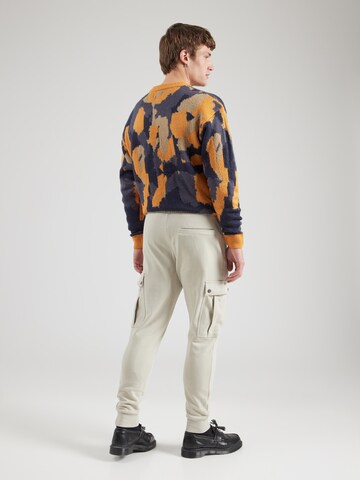 Tapered Pantaloni cargo 'Seteam' di BOSS in beige