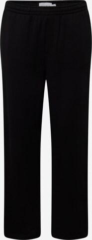 TOPMAN Regular Pants in Black: front