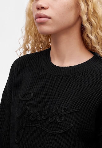 GUESS Pullover 'FAITH' in Schwarz
