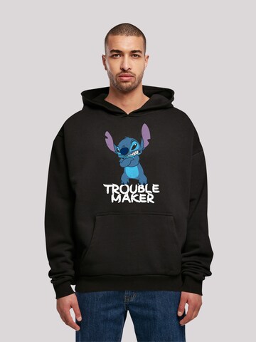 F4NT4STIC Sweatshirt 'Disney Lilo & Stitch Trouble Maker' in Schwarz: predná strana