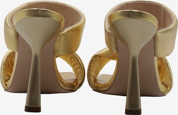 faina Mules in Gold