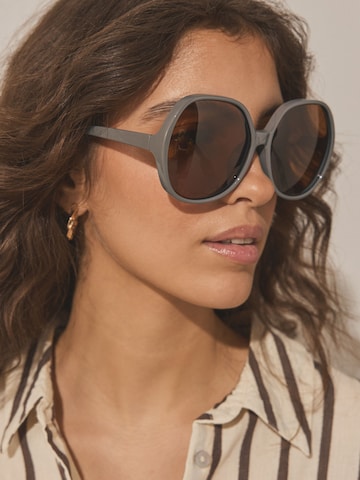 Lunettes de soleil Next en beige