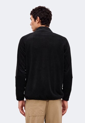 4F - Chaqueta polar funcional en negro: atrás
