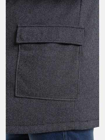 Charles Colby Tussenjas ' Sir Jonahs ' in Blauw