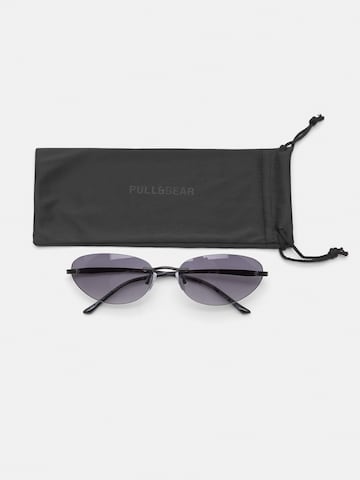Lunettes de soleil Pull&Bear en noir