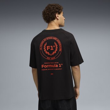 PUMA Functioneel shirt 'F1 75yrs' in Zwart: voorkant