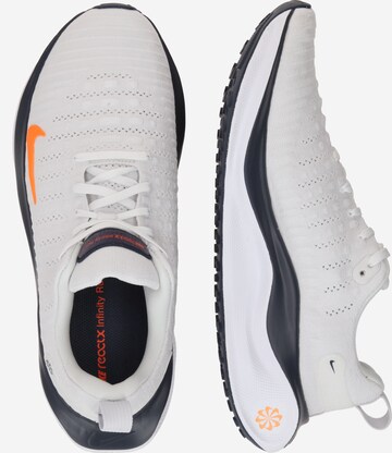 Scarpa da corsa 'React Infinity Run' di NIKE in bianco