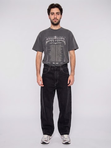Carhartt WIP Baggy Jeans 'Brandon' in Zwart: voorkant