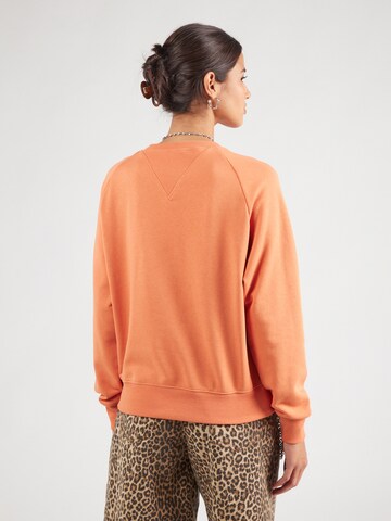 Champion Authentic Athletic Apparel Sweatshirt in Orange
