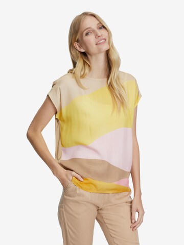 Cartoon T-shirt i beige: framsida