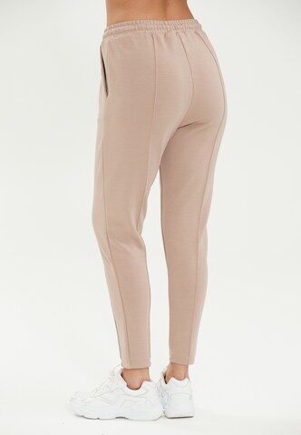 Athlecia Skinny Sweatpants 'Jacey' in Beige