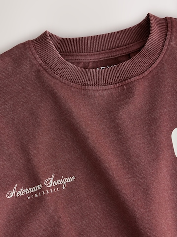 Next - Camiseta en rojo
