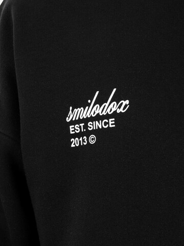 Veste de survêtement Smilodox en noir