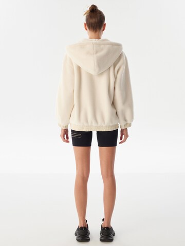 Twist Zip-Up Hoodie in Beige