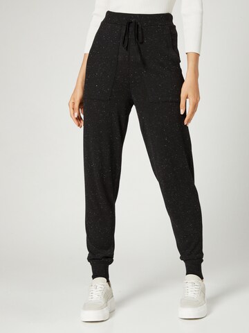 Guido Maria Kretschmer Women Tapered Trousers 'Jenny' in Black: front